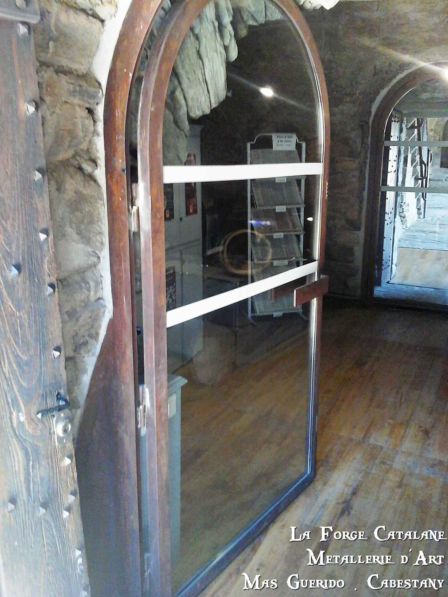 porte cintree corten vitrage vitre prieure de serrabone conseil general 66 forge catalane.jpg